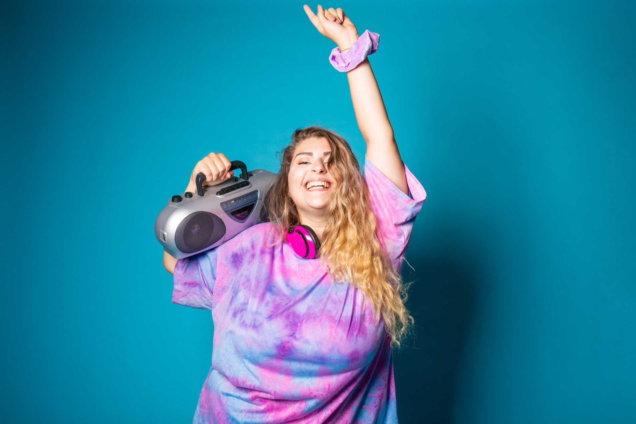 Young plus Size Chubby Woman Dancing with Stereo Listening Music